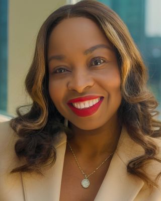 Smiling woman with red lipstick and necklace